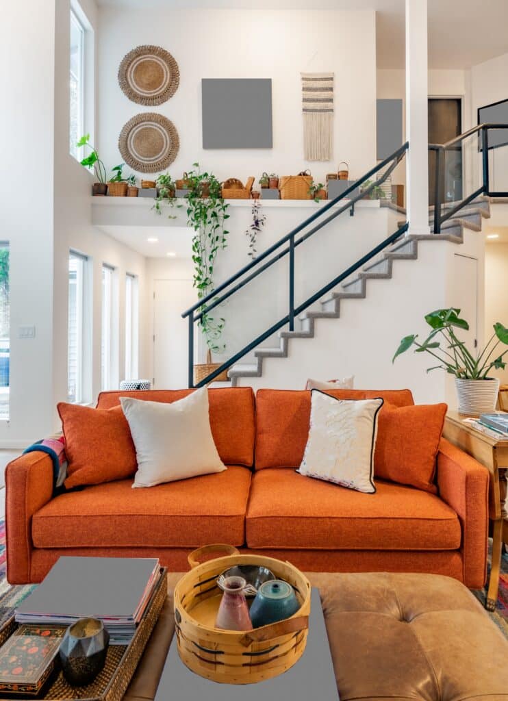 bohemian room with a white painted staircase with black railings into a loft 