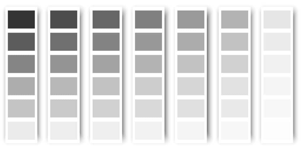 7 paint samples rectangles of different variations of white and grey