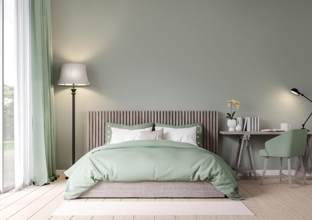 Bedroom with soft-green color palette.