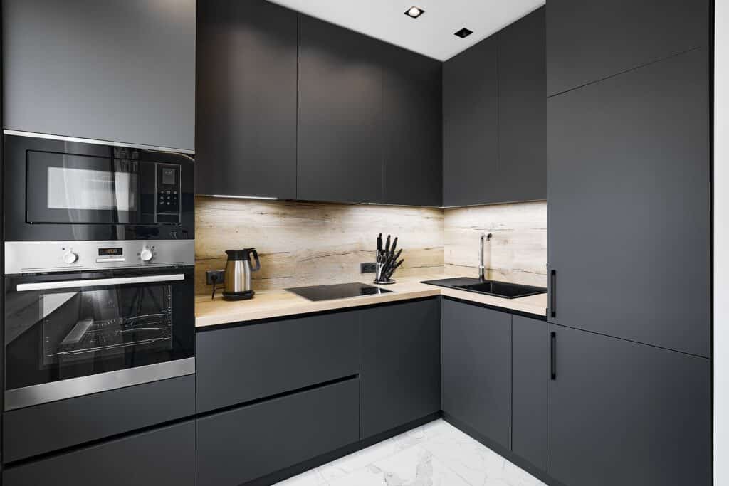 cabinets painted black with white floor kitchen