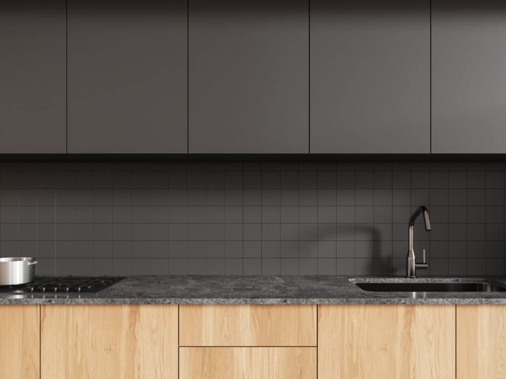 black painted cabinets with wood accent
